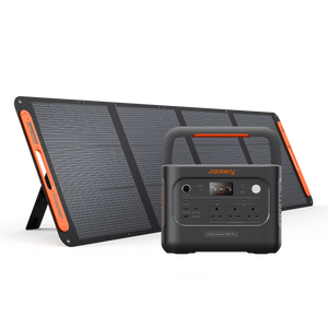 Jackery 2000 Plus v2 portable power station and foldable solar panel bundle on a clean white background. The black power station with orange accents is in front, and the matching solar panel stands behind it on its fold-out stand.